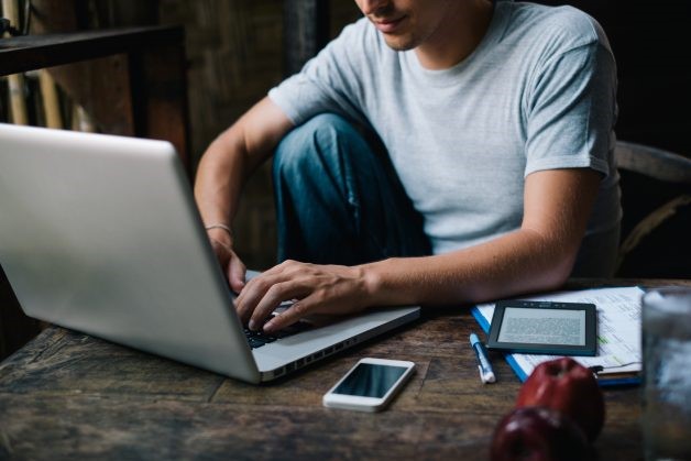 Person working on a notebook VA - Channelize Business Goals
